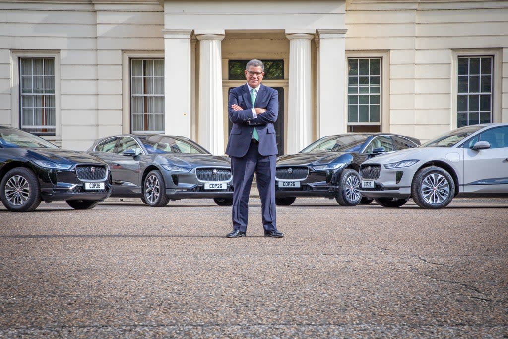 Cop26 President Alok Sharma with Jaguar electric vehicles (Cop26/PA)