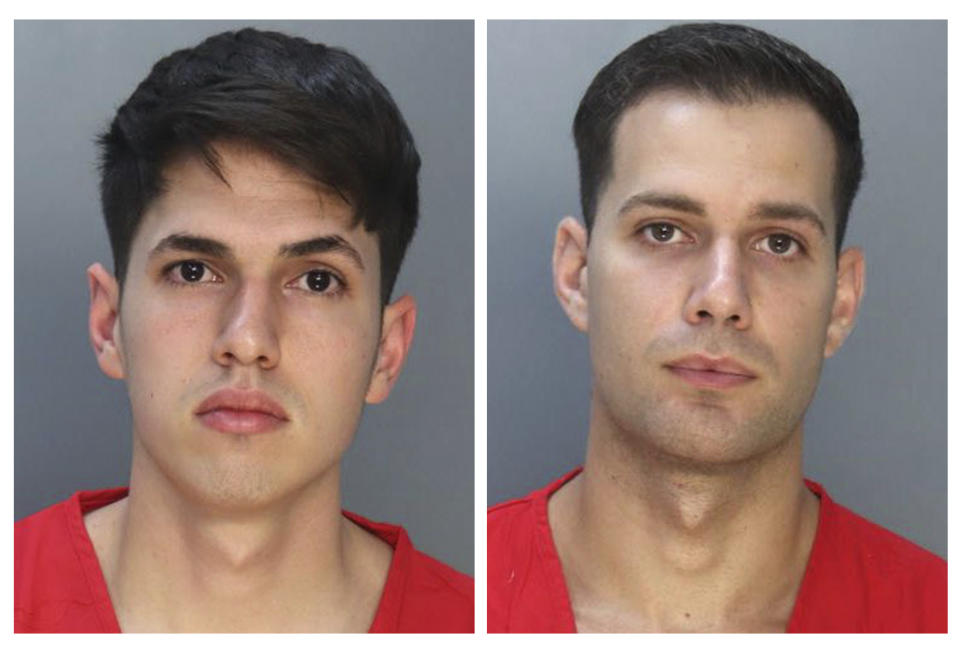 This combo of booking photos provided by the Miami-Dade County Corrections and Rehabilitation show Lorenzo Orfila, 27, left, and Rafael Otano, 22, who were booked into jail Thursday morning, Jan. 26, 2023, in Miami. The two former South Florida police officers turned themselves in to face felony charges over the beating of a homeless man who had been drinking outside a shopping center last month. (Miami-Dade County Corrections and Rehabilitation via AP)