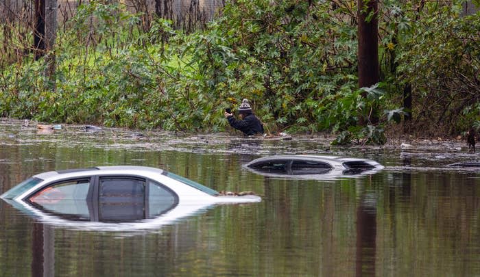 Two cars were partially submerged in water in Long Beach on Feb. 1.