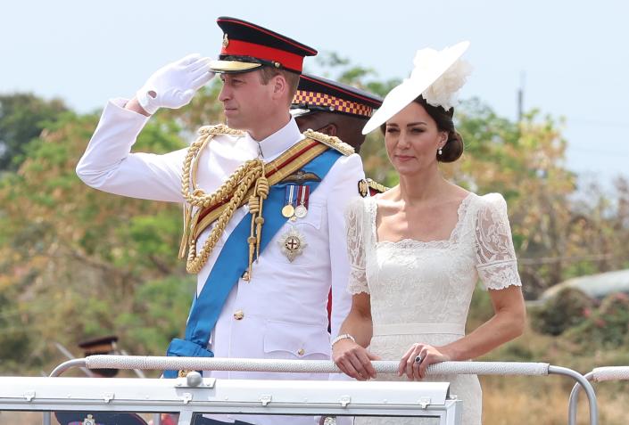 Prince William, Duke of Cambridge and Catherine, Duchess of Cambridge smile as they attend the inaugural Commissioning Parade for service personnel from across the Caribbean who have recently completed the Caribbean Military Academy&#x002019;s Officer Training Programme, at the Jamaica Defence Force on day six of the Platinum Jubilee Royal Tour of the Caribbean on March 24, 2022 in Kingston, Jamaica.