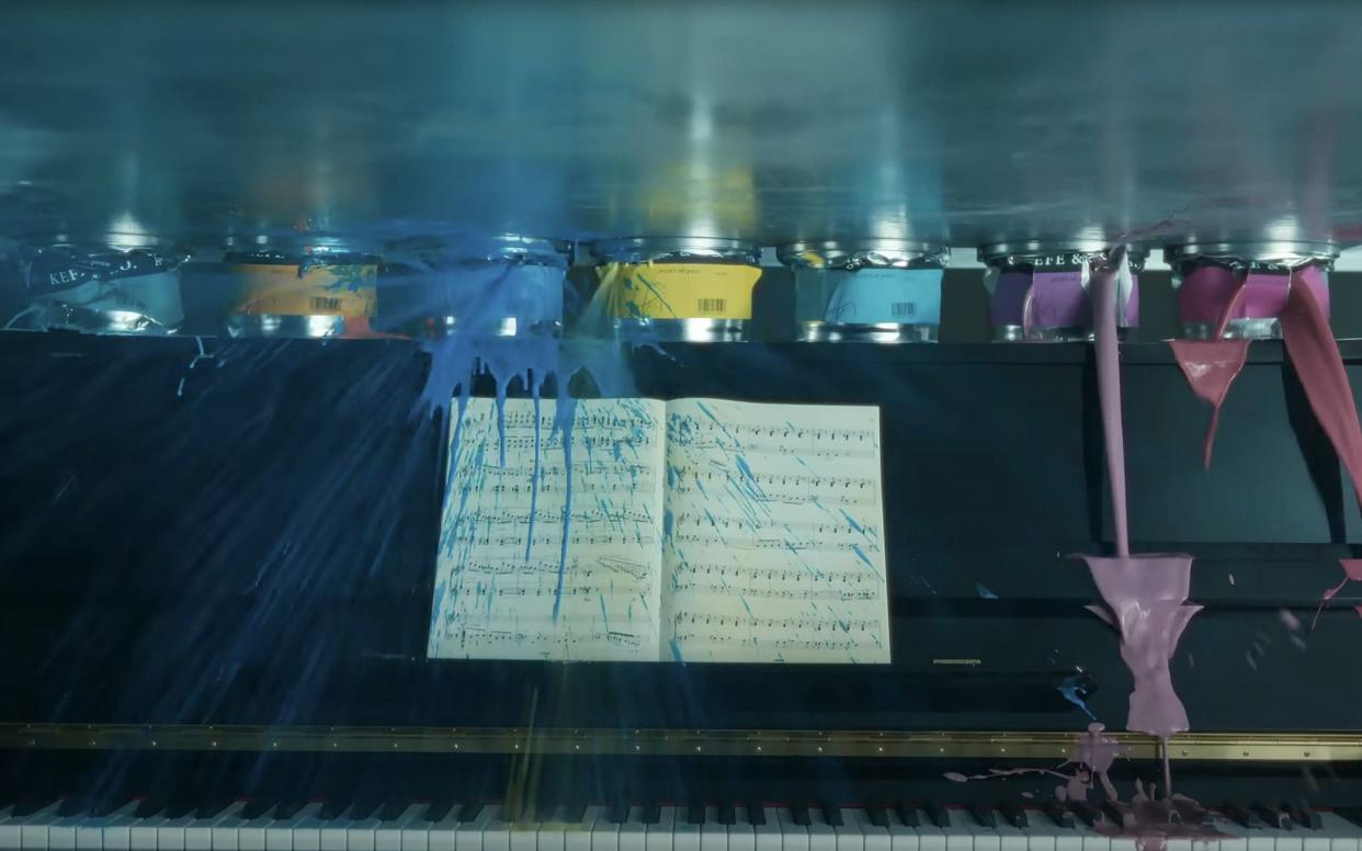 The new advert features musical instruments, paints and toys being crushed, while the iPad emerges intact