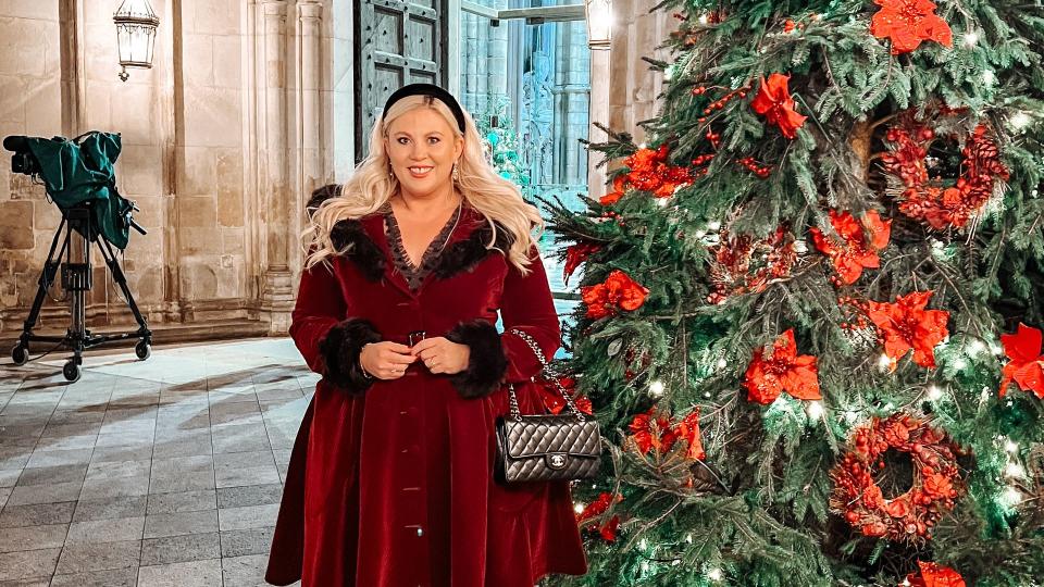Louise Pentland in front of a Christmas tree in Westminster Abbery