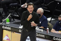 Utah Jazz coach Quin Snyder shouts to his team during the first half of the team's NBA basketball game against the Los Angeles Clippers on Friday, Jan. 1, 2021, in Salt Lake City. (AP Photo/Rick Bowmer)