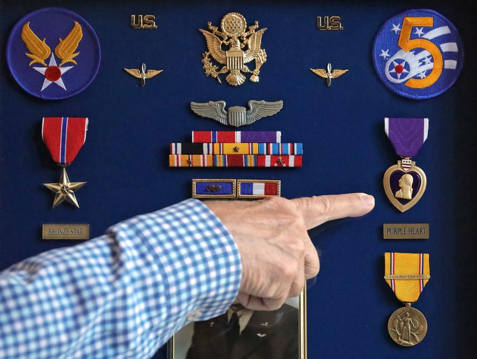 Jay Musson points out that his relative Ralph Musson was awarded the Purple Heart and Bronze Star for his heroic acts during World War II.