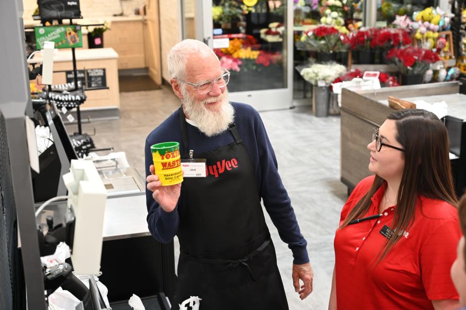 Late-night talk show host David Letterman stopped by a Hy-Vee grocery store in Grimes to bag some groceries, stock some shelves and amuse shoppers.