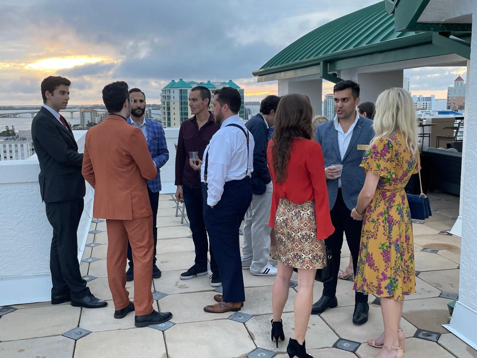 Guests gather on a rooftop for a kick-off part for the return of Sarasota Opera’s DaCapo Society, which was created to attract young professionals to performances with the addition of social activities.