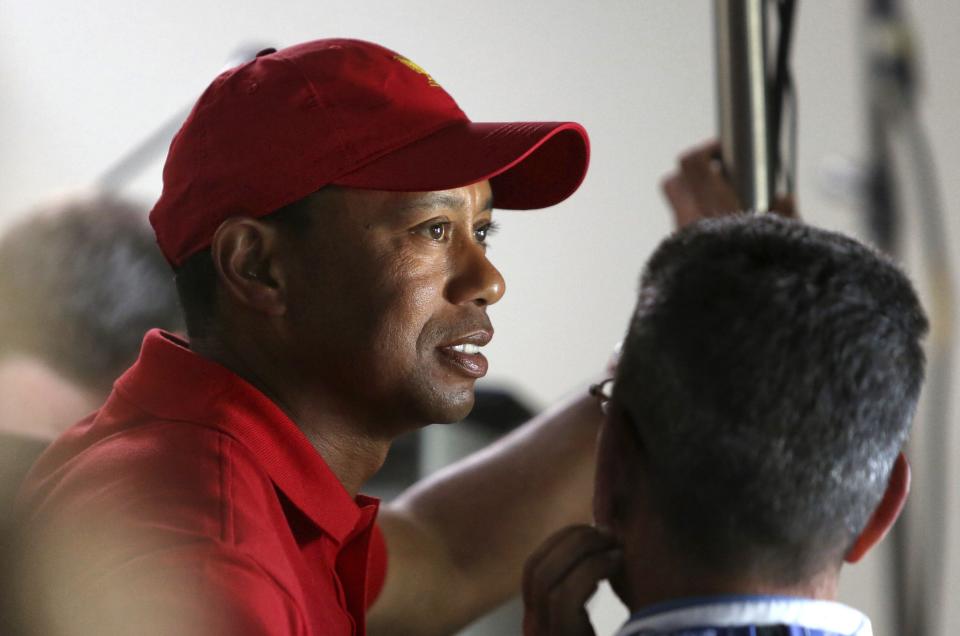 Tiger Woods waits offstage before the start of a news conference at the Arnold Palmer Invitational golf tournament at Bay Hill. (AP)