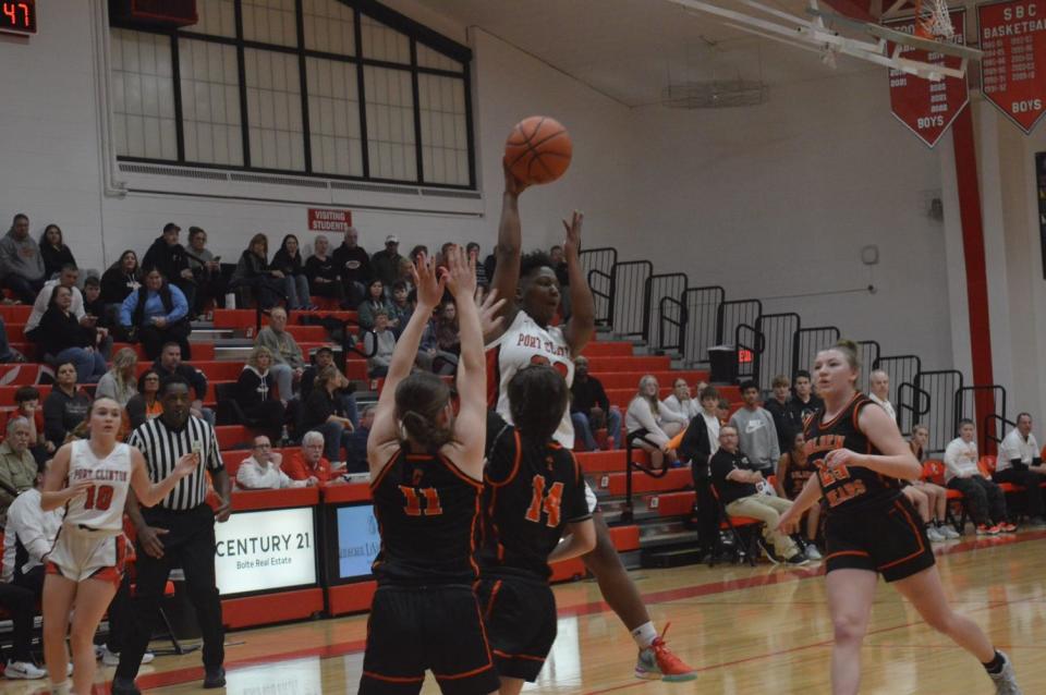 Port Clinton's DC Lanier passes the ball.