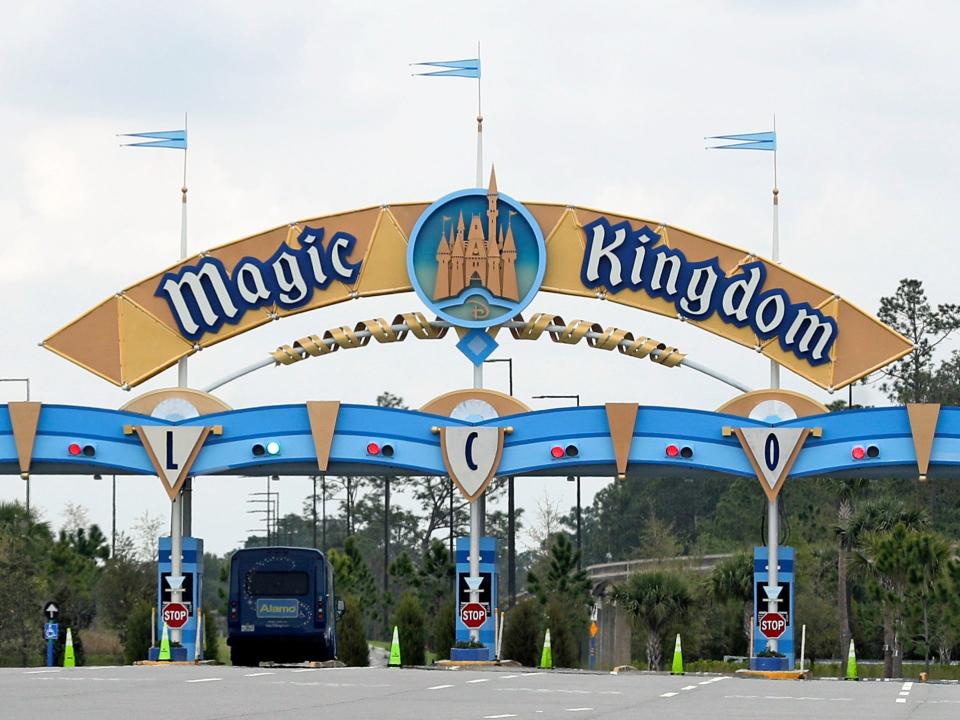 FILE - In this March 16, 2020, file photo, the entrance to the parking lot at the Magic Kingdom at Walt Disney World is closed in Lake Buena Vista, Fla. The Splash Mountain ride at Disney parks in California and Florida is being recast. Disney officials said the ride would no longer be tied to the 1946 movie, "Song of the South," which many view as racist. Instead, the revamped ride will be inspired by the 2009 Disney film, "The Princess and the Frog," which has an African-American female lead. (AP Photo/John Raoux, File)