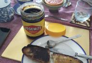 This Aug. 11, 2015 photo shows a jar of Vegemite purchased in Australia on a breakfast table in Tokyo, Japan. Vegemite, the salty spread beloved in Australia, is being sold by the maker of Oreo cookies to an Australian dairy company. The spread and other grocery products are being sold by Mondelez to Bega Cheese in a deal worth about $345.3 million. Mondelez International Inc. said Wednesday, Jan. 18, 2017, it is selling most of its grocery business in Australia and New Zealand to focus on snacks like Oreo cookies and chocolate like Cadbury. (AP Photo/Hiroshi Otabe)