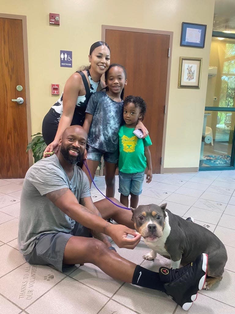 The Smith Family reuniting with their dog, Jill.