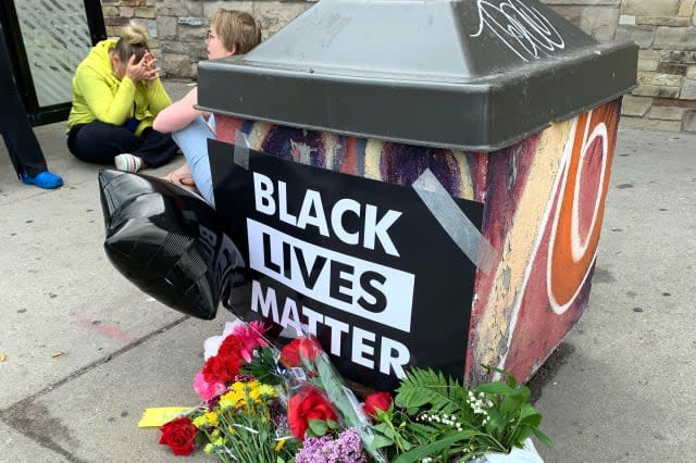 Video shows US officer kneeling on neck of black man who died