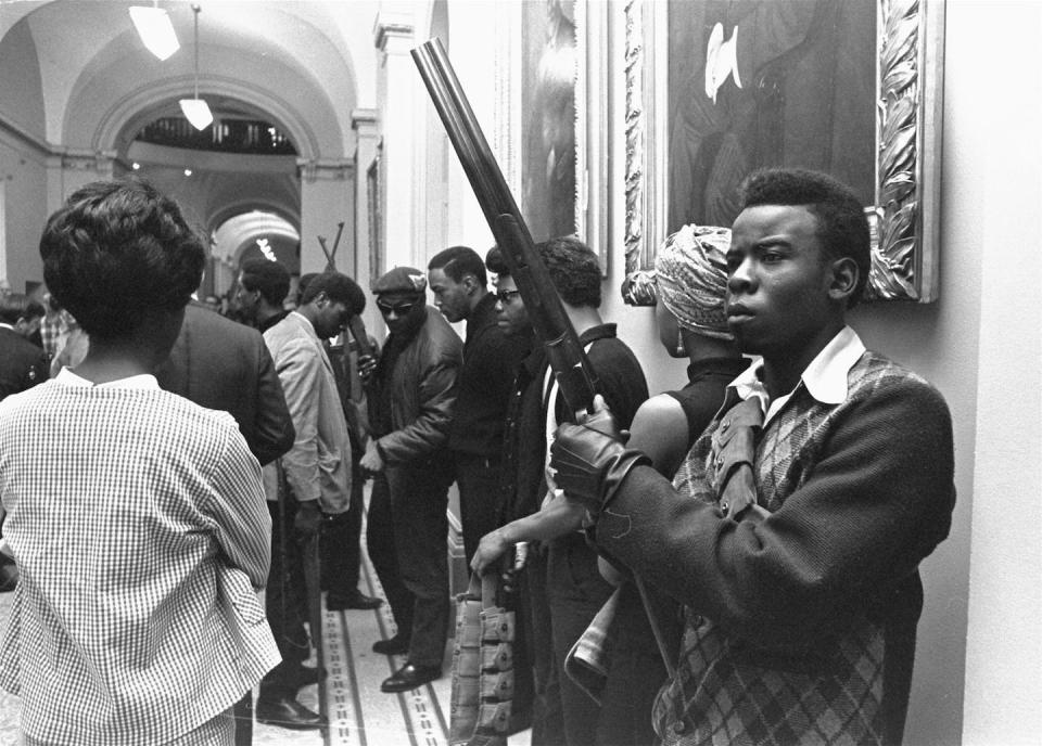 Armed members of the Black Panther Party stand in the corridor of California’s capitol in May 1967. <a href="https://newsroom.ap.org/detail/HueyNewton/176d2c81ae1648cda9038c36e3aa7b15/photo?Query=black%20panthers%20guns&mediaType=photo&sortBy=arrivaldatetime:desc&dateRange=Anytime&totalCount=28&currentItemNo=0" rel="nofollow noopener" target="_blank" data-ylk="slk:Walt Zeboski/AP Photo;elm:context_link;itc:0;sec:content-canvas" class="link ">Walt Zeboski/AP Photo</a>