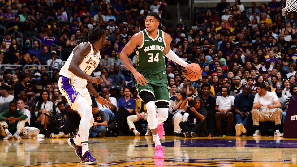 Antetokounmpo dribbles the ball during a game against the Lakers. - Adam Pantozzi/NBAE/Getty Images