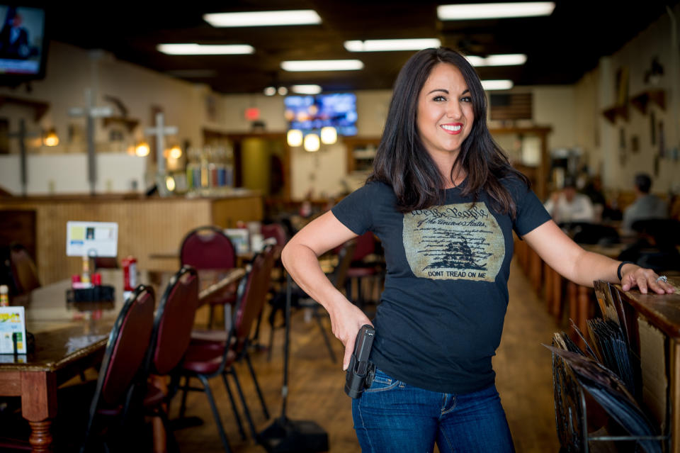 Owner Lauren Boebert poses for a portrait at Shooters Grill in Rifle, Colorado on April 24, 2018. - Lauren Boebert opened Shooters Grill in 2013 with her husband Jason in the small town of Rifle, Colorado, the only city in the United States named after a gun according to them. (Emily Kask/AFP via Getty Images)