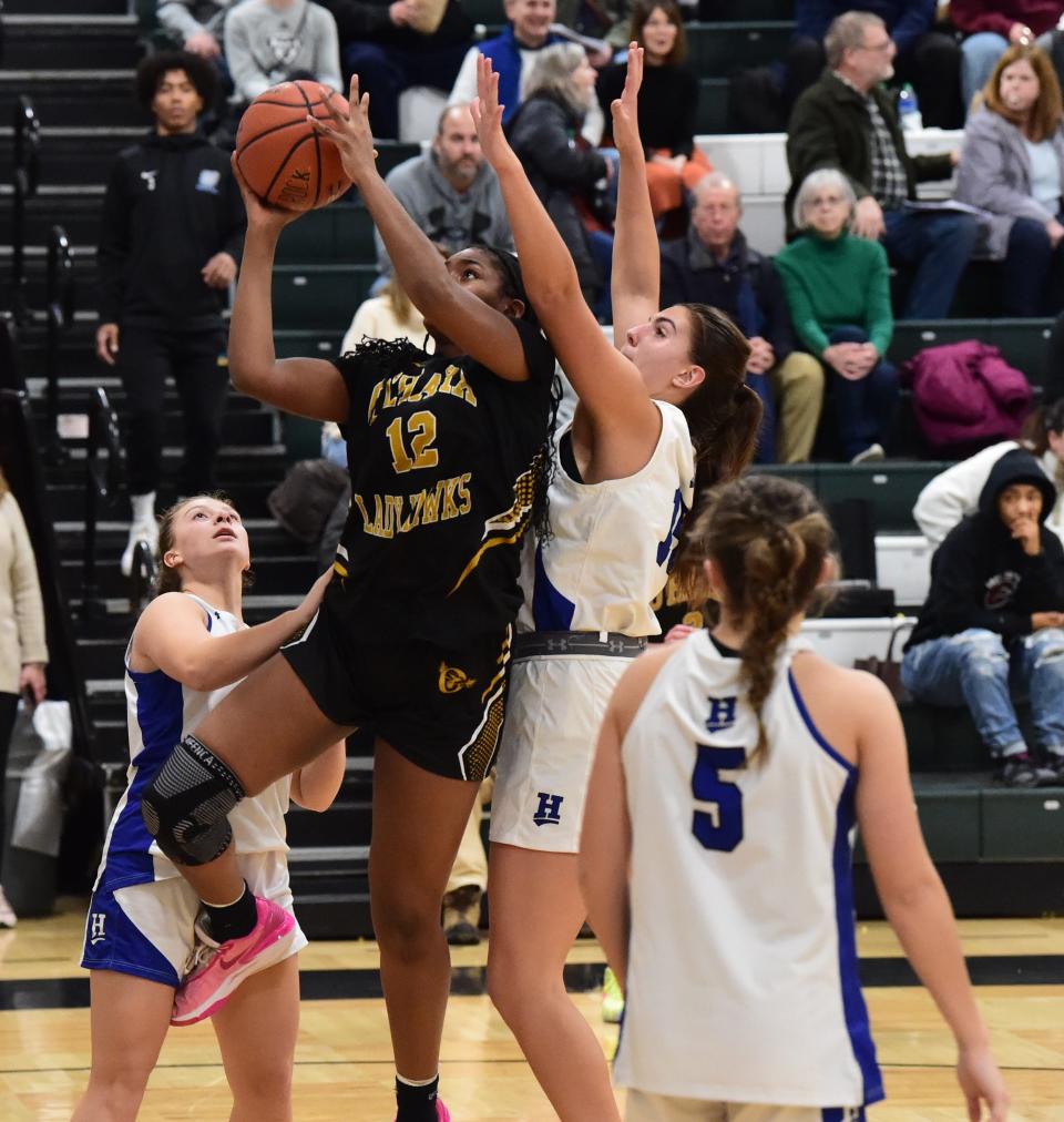Cardinal O'Hara's Kyla Hayes (12) goes up for a shot during a 71-42 win over Horseheads in a Girls Division game at the Josh Palmer Fund Clarion Classic on Dec. 27, 2023 at Elmira High School.