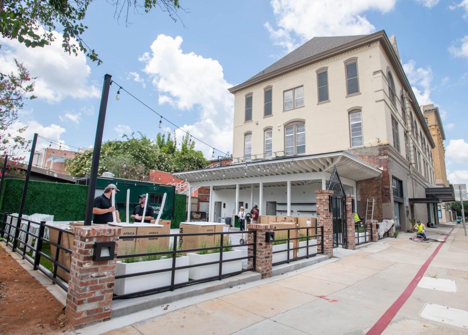Vinyl Music Hall’s B Side outdoor venue with the in Proper Burger food truck along Garden Street in downtown Pensacola on Wednesday, July 5, 2023.