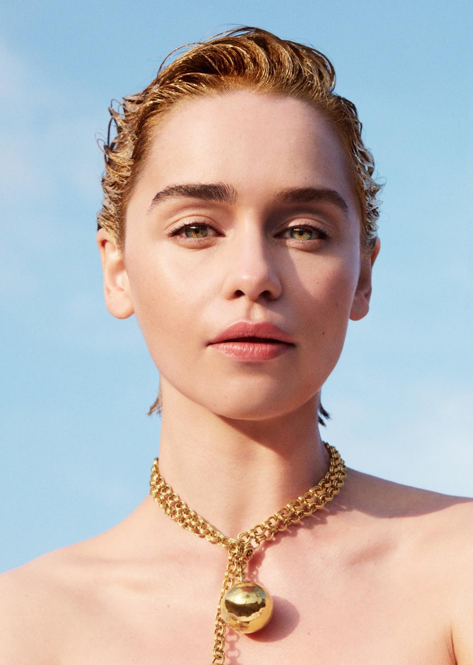 <cite class="credit">Bottega Veneta necklace. Makeup colors: Tinted Moisturizer Illuminating in Bare Radiance, Eye Brow Gel, and Lip Glacé in Cosmic by Laura Mercier.</cite>