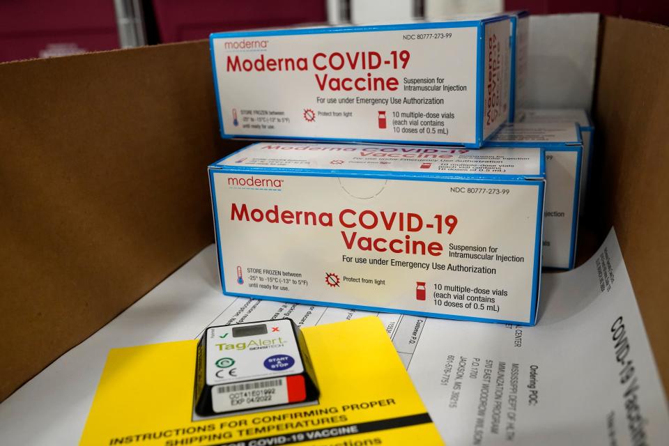 Boxes containing the Moderna COVID-19 vaccine are prepared to be shipped at the McKesson distribution center in Olive Branch, Miss., Sunday, Dec. 20, 2020. 