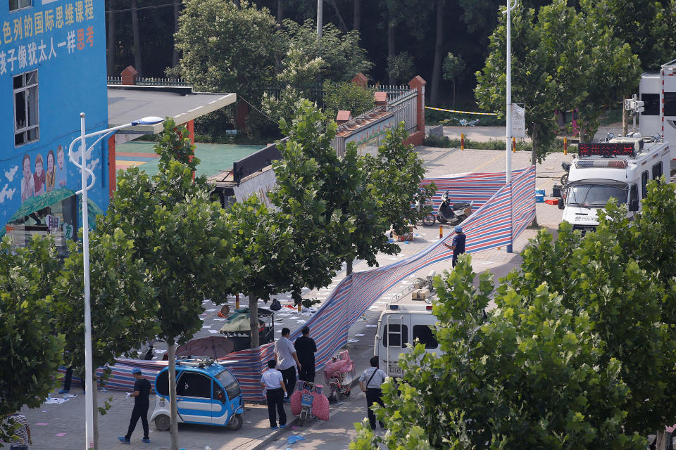 <p>Investigators work at the scene of an explosion inside a kindergarten in Fengxian County in Jiangsu Province, China , June 16, 2017. (Photo: Aly Song/Reuters) </p>