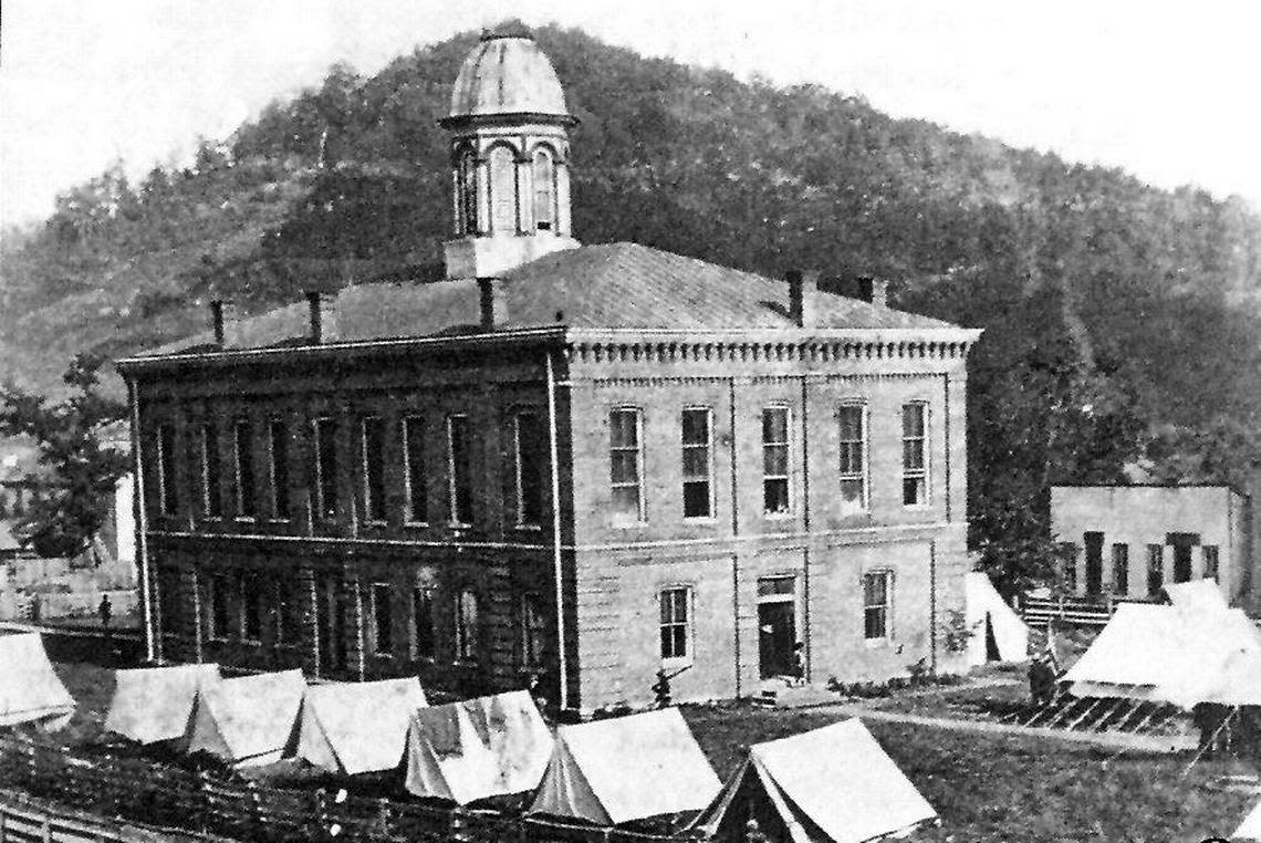 The governor of Kentucky sent troops to Manchester Ky., in June 1899 to protect Thomas Baker, who faced a murder charge. This photo shows tents pitched outside the courthouse.