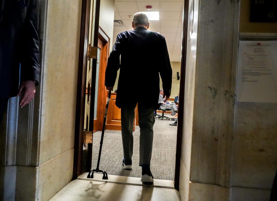 Senate President Dominick Ruggerio attends a meeting on the first floor of the State House on Tuesday.