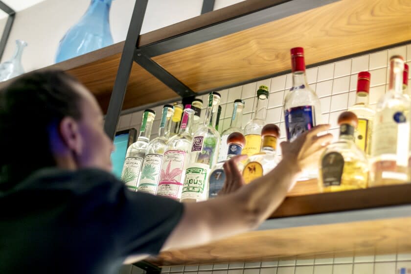 LOS ANGELES, CALIFORNIA - July 19, 2019: A bartender works the bar at Pikoh on Friday evening, July 19, 2019, at the Ricardo Zarate's new Peruvian-influenced bistro on Pico Blvd. (Silvia Razgova / For The Times) Assignment ID: 459345