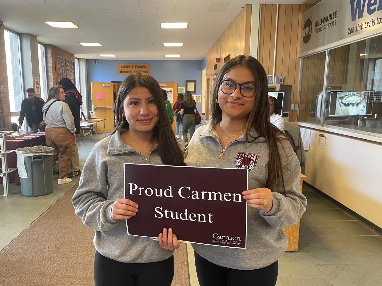 Tatiana Serna and America Perez, students at Carmen South High School, attended a school board meeting April 23.