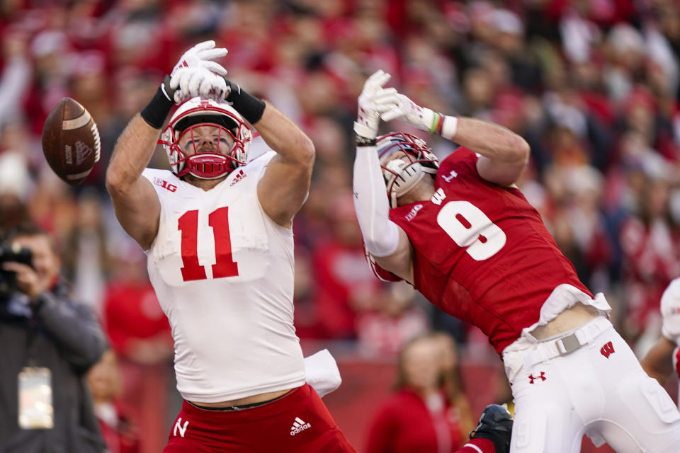 Nebraska tight end AScott Nelson (11) can't make a reception in the end zone against Wisconsin safety Scott Nelson (9) during the first half of an NCAA college football game Saturday, Nov. 20, 2021, in Madison, Wis. (AP Photo/Andy Manis)