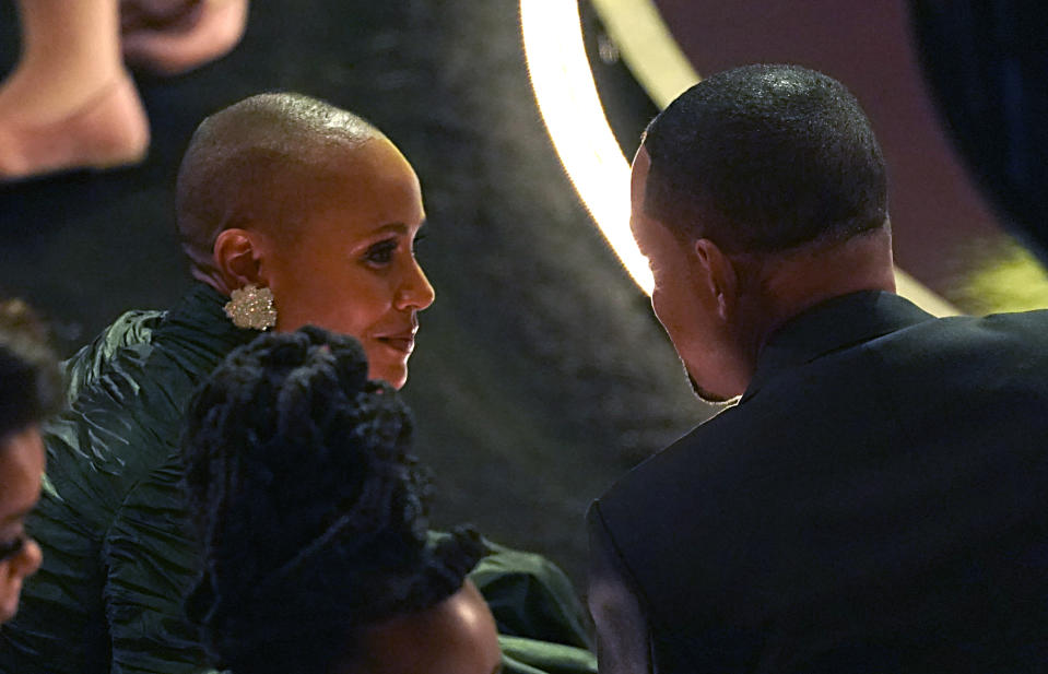 Jada Pinkett Smith, left, and Will Smith appear in the audience at the Oscars on Sunday, March 27, 2022, at the Dolby Theatre in Los Angeles. (AP Photo/Chris Pizzello)