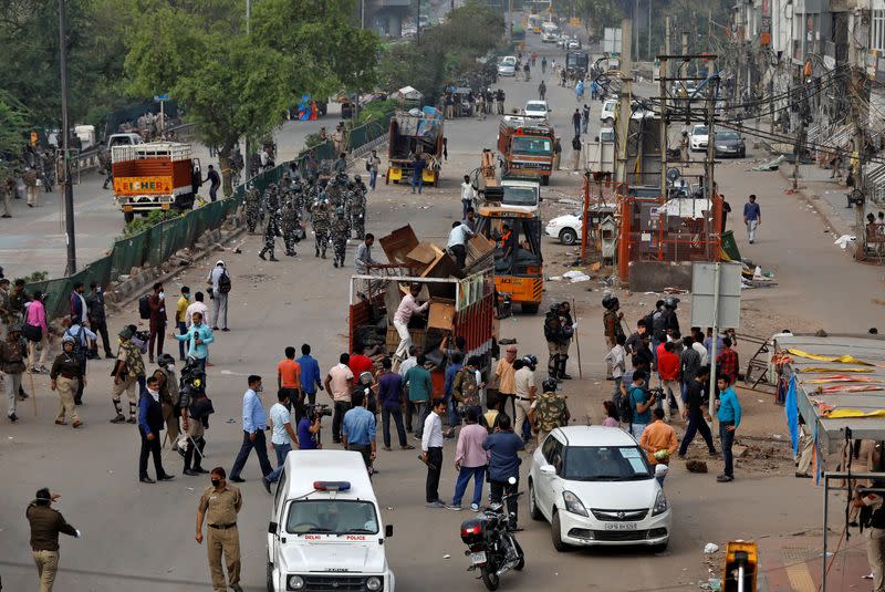 Police clear the site of the longest-running protest against a new citizenship law following the lockdown by Delhi state government, in New Delhi