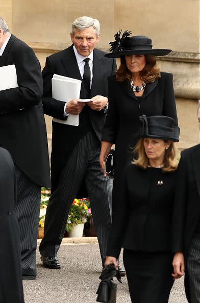 WINDSOR, ENGLAND - SEPTEMBER 19: Michael Middleton and Carole Middleton arrive at Windsor Castle ahead of the Committal Service for Queen Elizabeth II on September 19, 2022 in Windsor, England. The committal service at St George's Chapel, Windsor Castle, took place following the state funeral at Westminster Abbey. A private burial in The King George VI Memorial Chapel followed. Queen Elizabeth II died at Balmoral Castle in Scotland on September 8, 2022, and is succeeded by her eldest son, King Charles III. (Photo by Ryan Pierse/Getty Images)