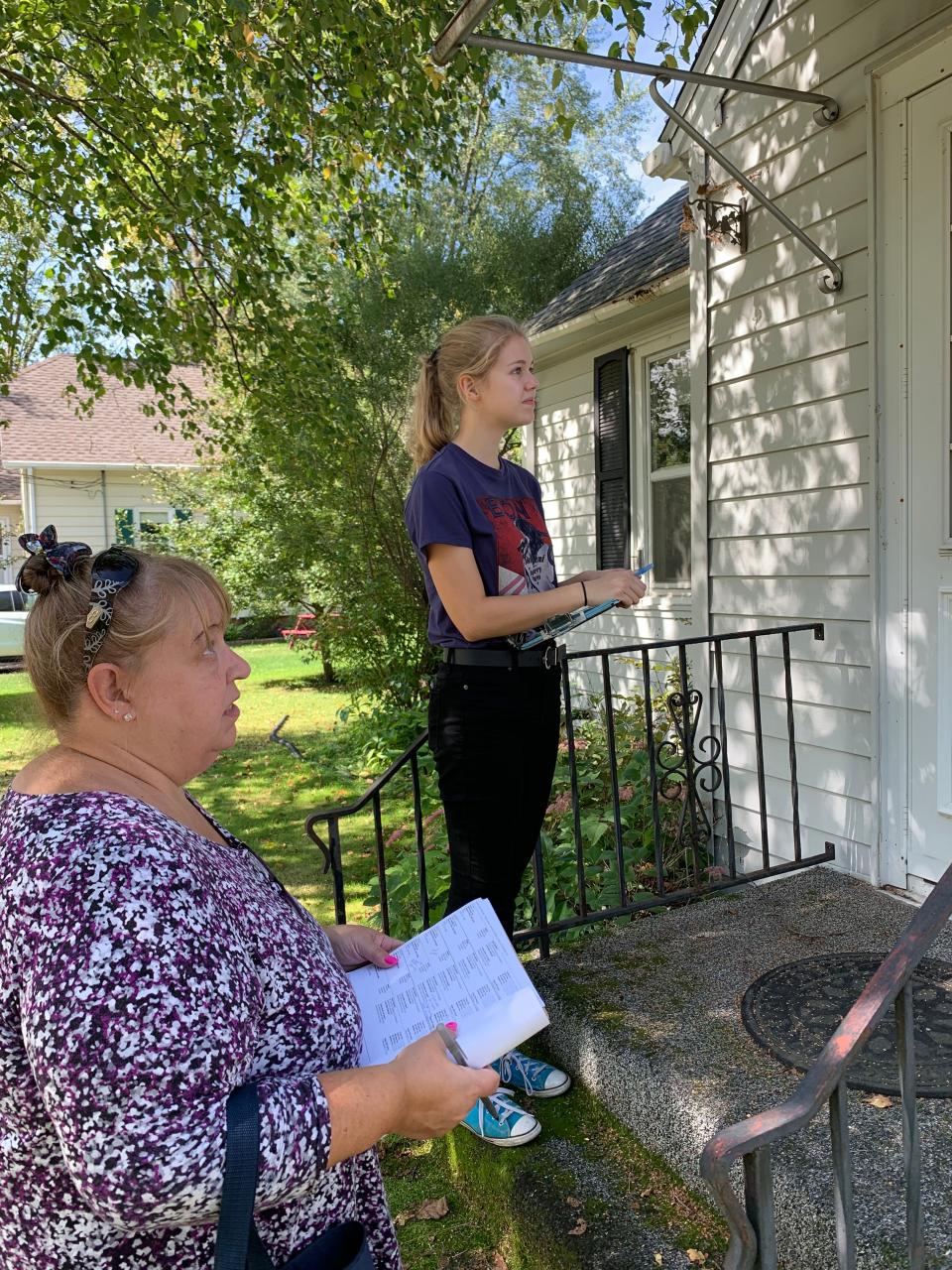 Democratic Party activists Hayley Bird (right) and Joan Garski canvass in Stevens Point, Wis. more than 13 months before the 2020 presidential election.