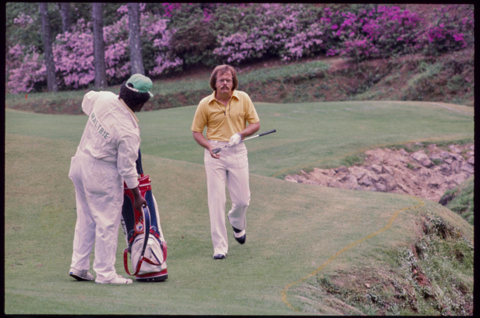 Roger Maltbie chips ball with caddie watching at the Augusta National Golf Course during the 1976 Masters. File Photo: The Augusta Chronicle via USA TODAY NETWORK