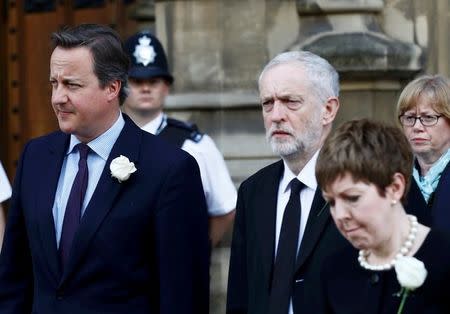 Britain's Prime Minister David Cameron walks from Parliament to St Margaret's Church with Jeremy Corbyn (2nd R) the leader of the opposition Labour Party for a service of rememberance for Labour MP Jo Cox who was shot and stabbed to death last week outside her constituency surgery, in Westminster, London, June 20, 2016. REUTERS/Stefan Wermuth