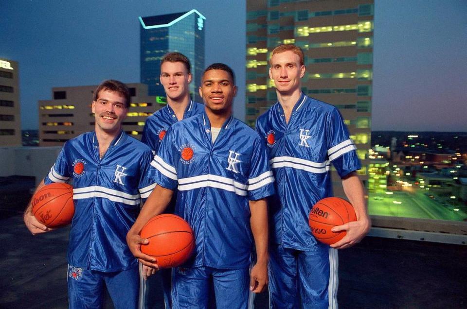 Kentucky’s “Unforgettables” posed for a photo together in 1992. From left, Richie Farmer, Deron Feldhaus, Sean Woods and John Pelphrey endured tough times at UK but stayed around long enough to see the program resurrected.