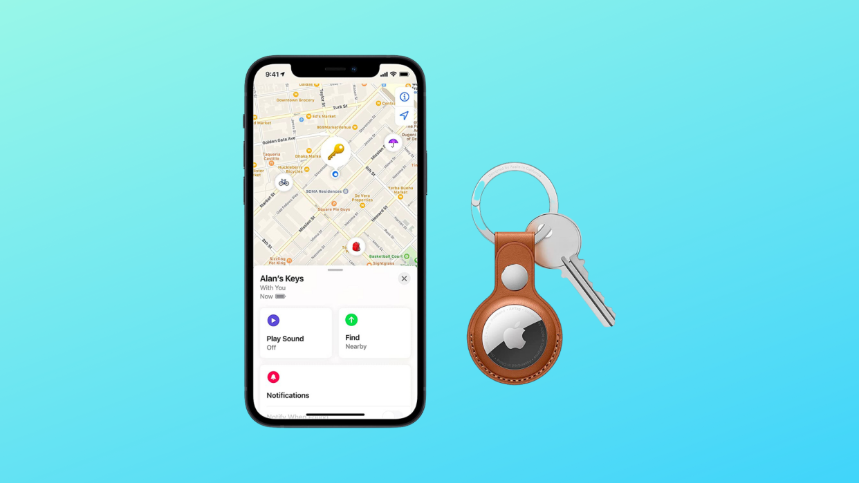 Airtags Apple à côté d'un iPhone