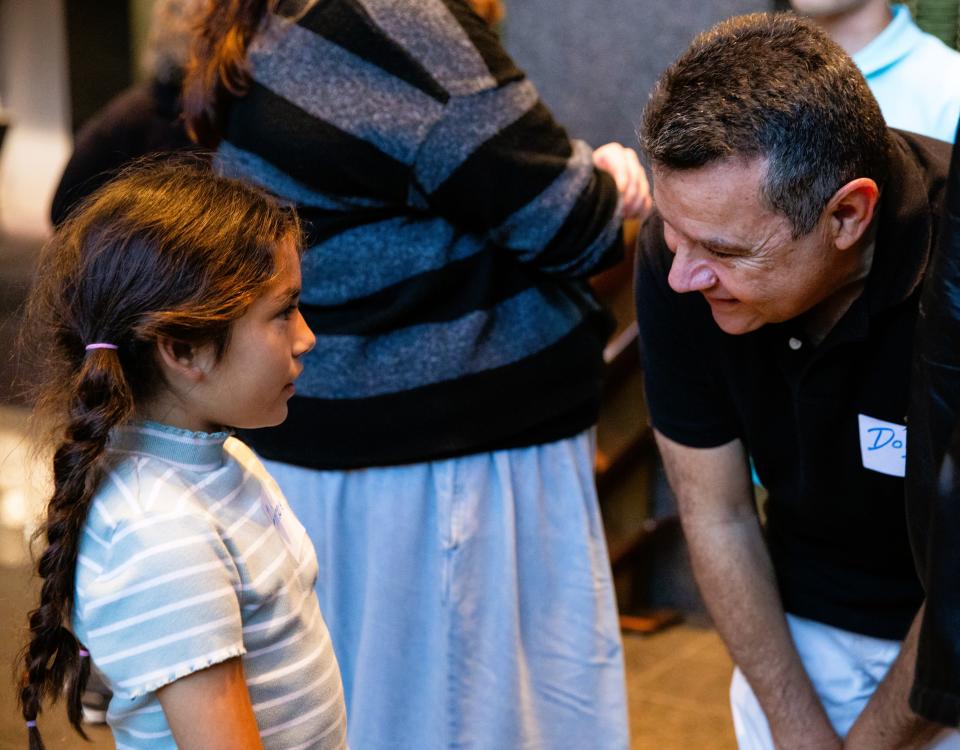 Ariadne Cabriales of Grupo Folklorio Tonantzin, left, chats with voice artist Doug Arbulu. They are both performing at the 26th annual McCallum Theatre Open Call Talent Project.