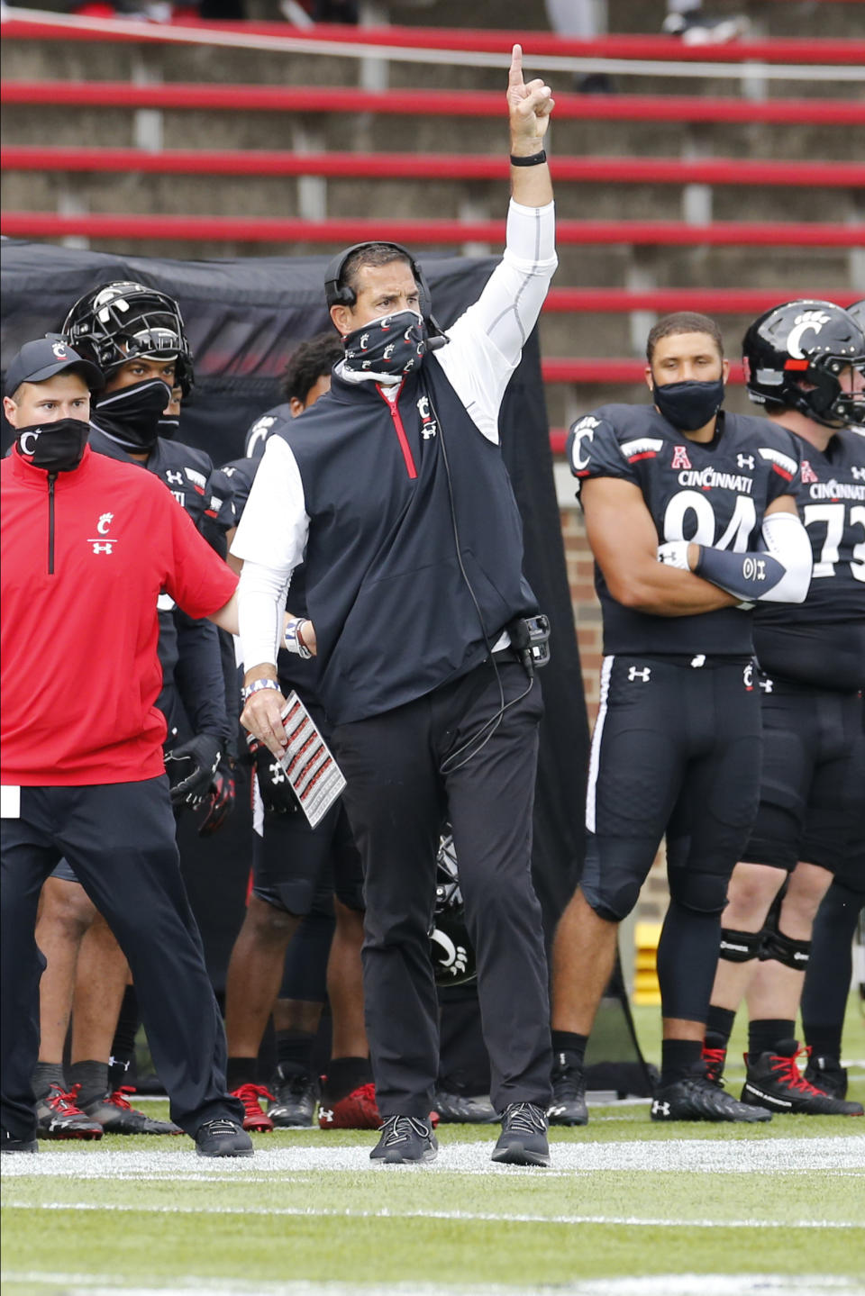 Cincinnati head coach Luke Fickell instructs his team against Army during the first half of an NCAA college football game Saturday, Sept. 26, 2020, in Cincinnati, Ohio. Cincinnati beat Army 24-10. (AP Photo/Jay LaPrete)