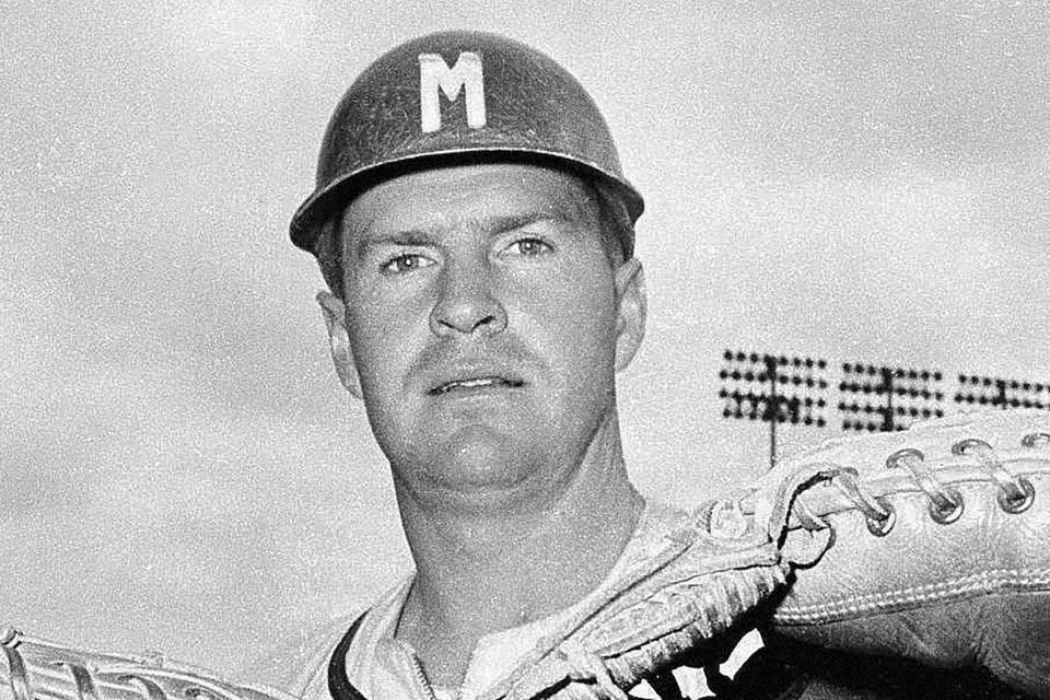 FILE - Milwaukee Braves catcher Del Crandall poses in Milwaukee in this Sept. 30, 1958, file photo. Crandall, a star catcher who played on two Milwaukee Braves teams that reached the World Series in the 1950s before managing the Milwaukee Brewers and Seattle Mariners, has died. He was 91. Crandall’s son Bill said his father was surrounded by family members as he died from circumstances of Parkinson’s disease Wednesday, May 5, 2021, at Mission Viejo, California. (AP Photo/File)