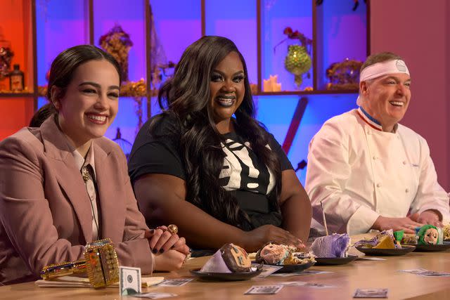 <p>Netflix</p> From left: guest judge Mary Mouser, Nicole Byer, and Jacques Torres on ‘Nailed It!’