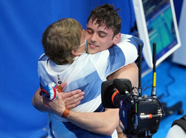 Tom Daley hugs coach Jane Figueiredo