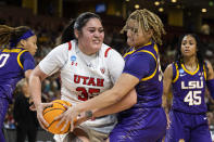 Utah's Alissa Pili (35) fights for control of the basketball with LSU's Kateri Poole (55) during the first half of a Sweet 16 college basketball game of the women's NCAA Tournament in Greenville, S.C., Friday, March 24, 2023. (AP Photo/Mic Smith)