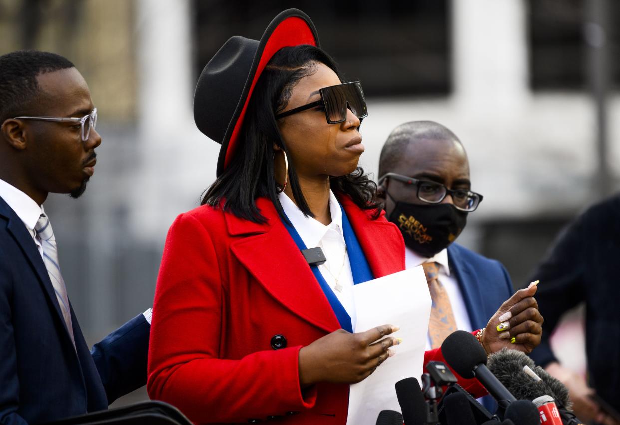 A tear rolls down the cheek of Bridgett Floyd, the sister of George Floyd, as she speaks during a press conference outside the Hennepin County Government Center on March 8, 2021, in Minneapolis, Minnesota. Jury selection was scheduled to begin today in the trial of former Minneapolis Police officer Derek Chauvin in the death of George Floyd last May, but has been postponed due to a pending addition of a third-degree murder charge in the case.