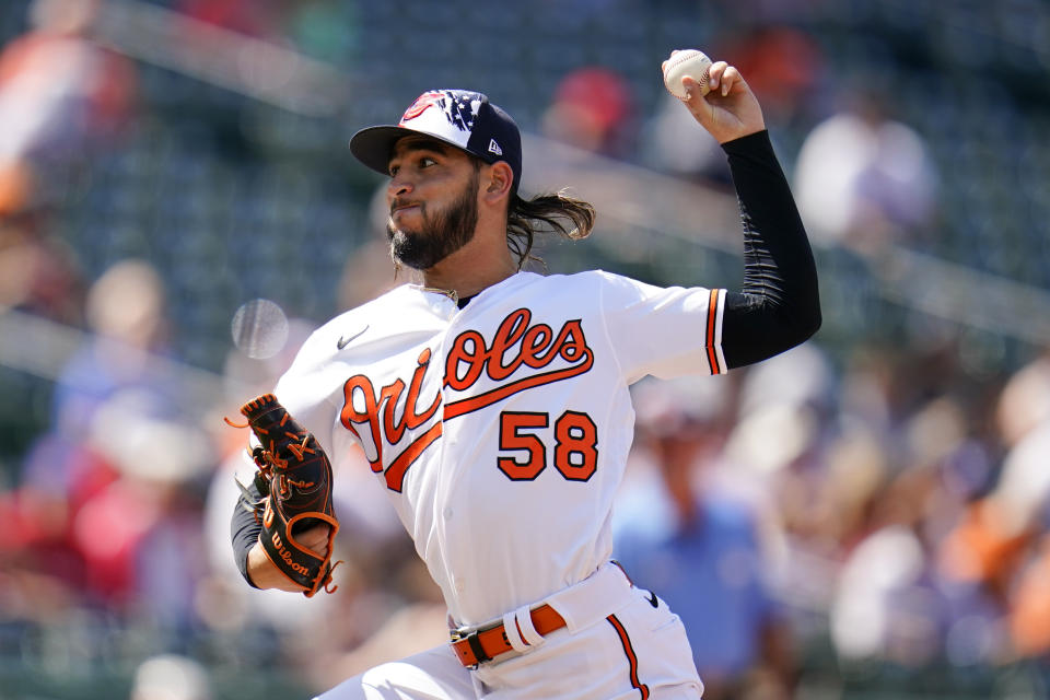 Baltimore Orioles relief pitcher Cionel Perez throws a pitch to the Texas Rangers during the eighth inning of a baseball game, Monday, July 4, 2022, in Baltimore. The Orioles won 7-6 in ten innings. (AP Photo/Julio Cortez)