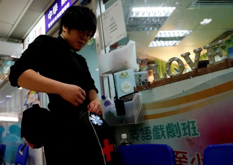 The Wider Image: Sermons with saline: Hong Kong pastor offers aid and prayers