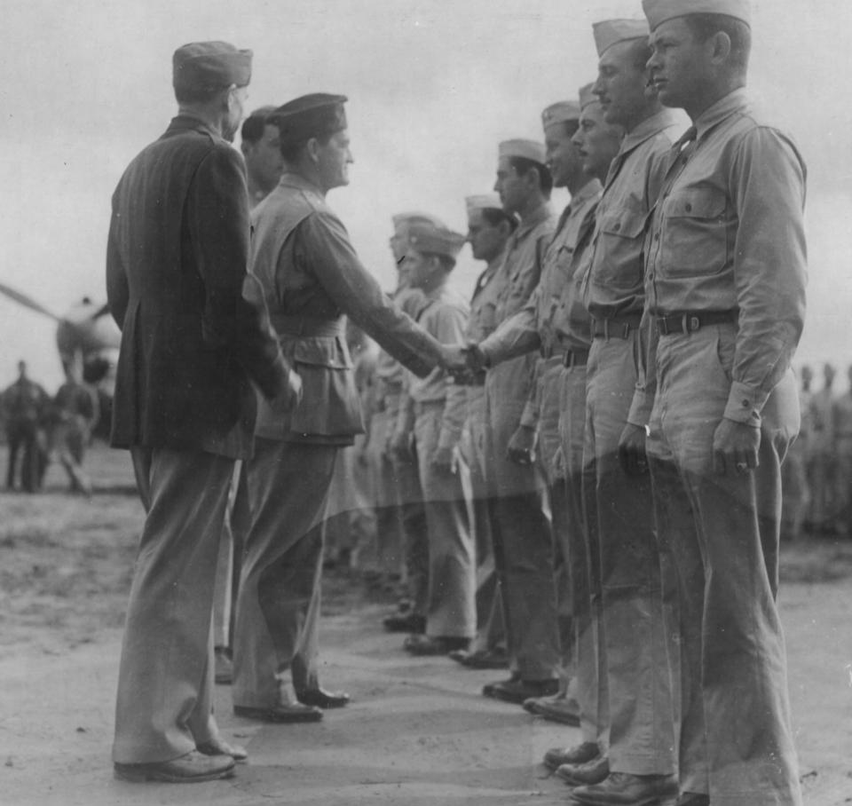 Elmer Tarbox, center right, was awarded the Silver Star for gallantry in action by Gen. Claire Lee Chennault in China on Dec. 20, 1942.