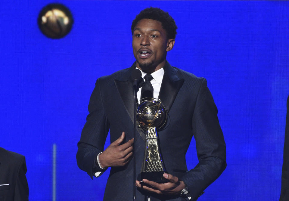 NBA player Bradley Beal, of the Washington Wizards, accepts the NBA cares community assist award at the NBA Awards on Monday, June 24, 2019, at the Barker Hangar in Santa Monica, Calif. (Photo by Richard Shotwell/Invision/AP)