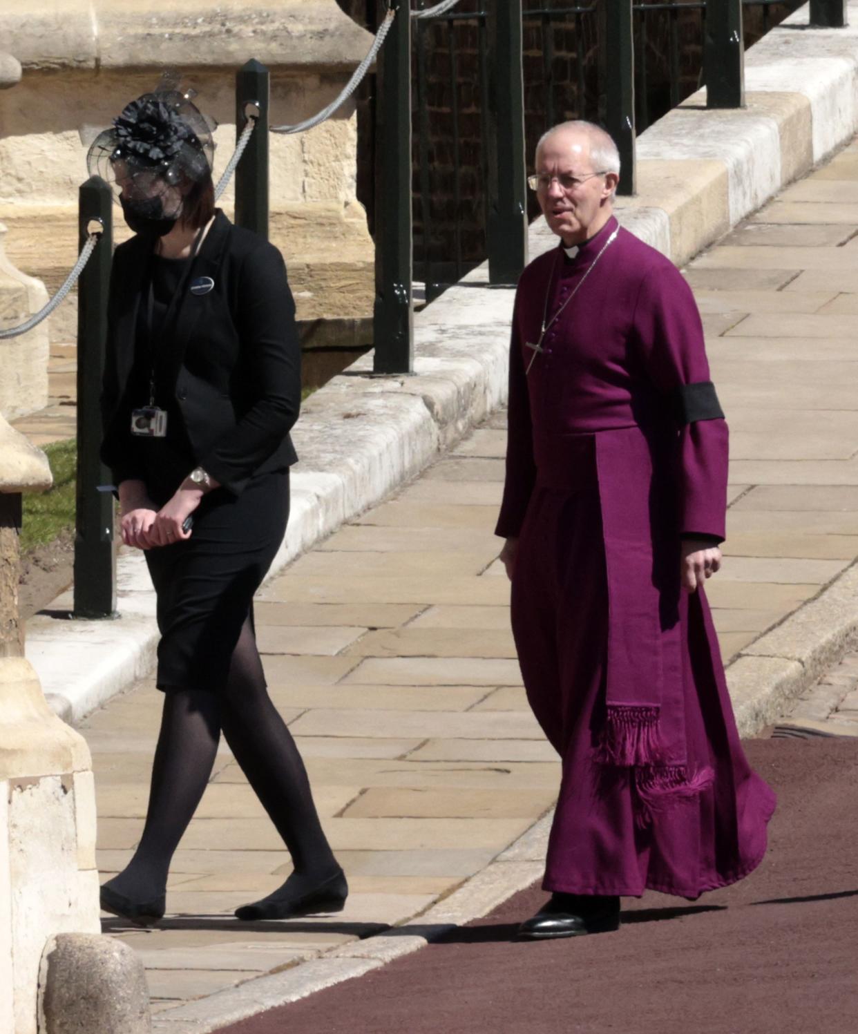 Archbishop of Canterbury Justin Welby, right, arrives at the Windsor Castle ahead of the funeral of Britain's Prince Philip in Windsor, England, Saturday, April 17, 2021.