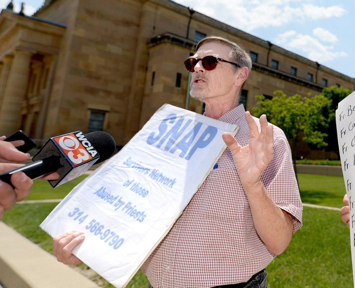 Former National Director of Survivors Network of those Abused by Priest David Clohessy speaks in front of the Cathedral of the Immaculate Conception Wednesday, May 24, 2023.